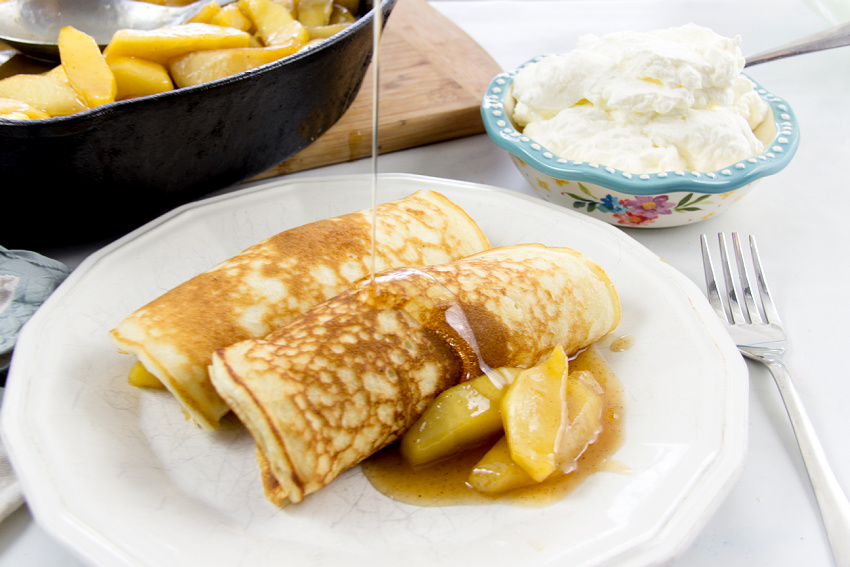 pancakes with apple compote drizzles with caramel maple syrup