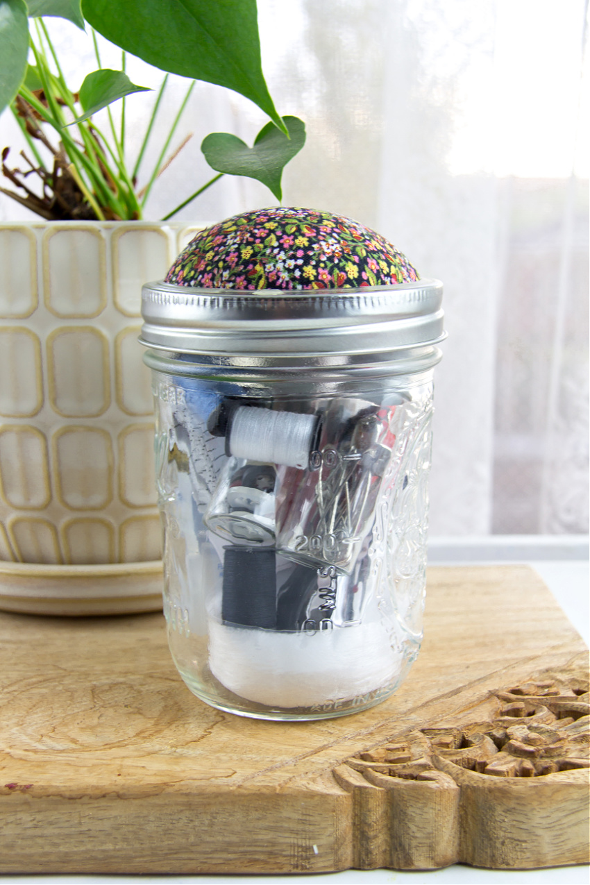 a diy jar pin cushion filled with sewing supplies for a college student gift