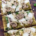 pesto chicken flatbread pizza with mozzarella spinach and mushrooms