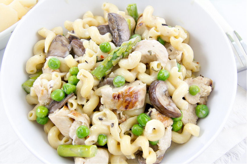 pasta with chicken, asparagus, mushrooms, and peas