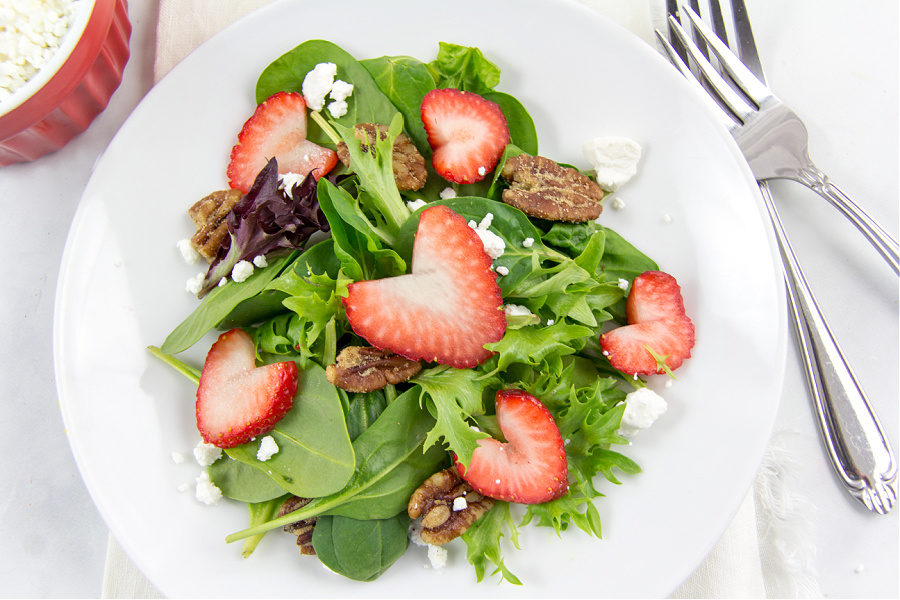 a strawberry sweetheart salad for valentines day with heart shaped strawberries