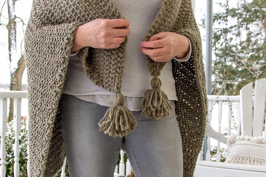 tassels on a chunky knit shawl