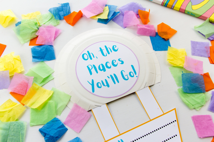 tissue paper cut into squares to decorate a paper plate balloon