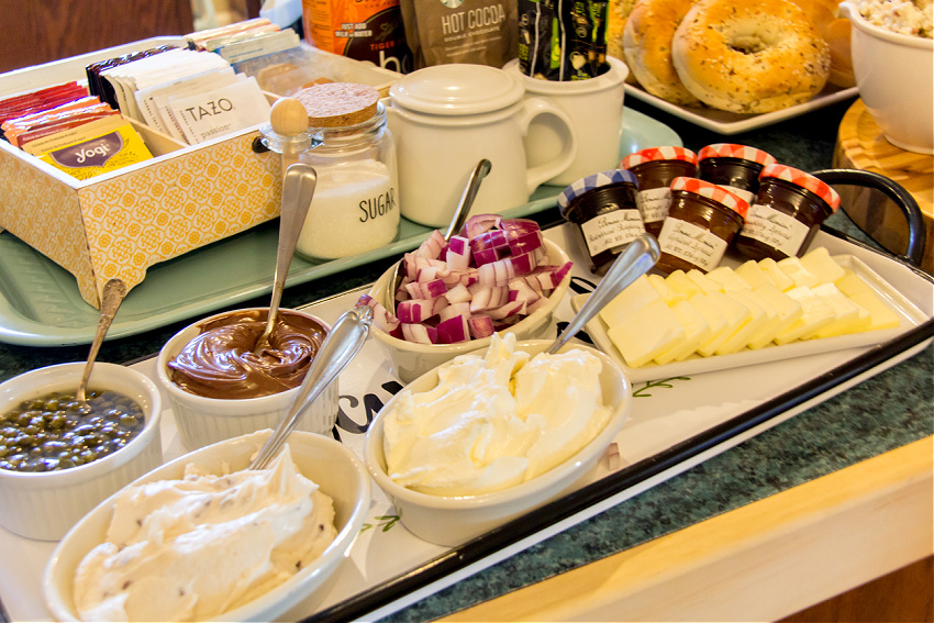 toppings for bagels including cream cheese, jellies, lox, and nutella