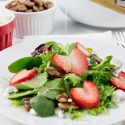 A Valentine's Day salad with heart shaped strawberries