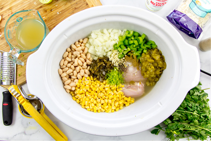 ingredients for white chicken chili in a slow cooker