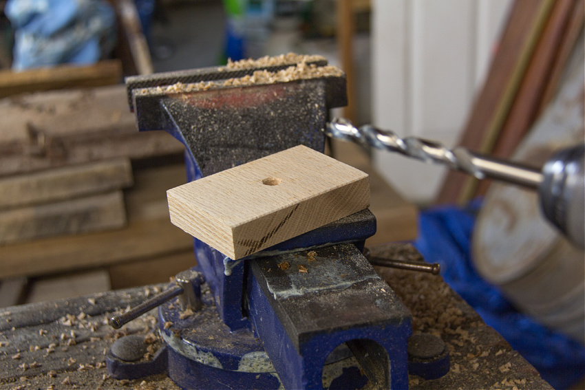 wood bases for christmas trees cut for a woodworking project for preschoolers